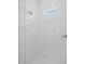 Clean shower with subway tile and a window for ventilation at 12550 Mohican Ave, Port Charlotte, FL 33953