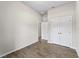 Bedroom with double doors leading to a large closet at 1417 Longson St, Port Charlotte, FL 33953
