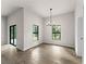 Bright dining room with tile floors and access to patio at 1417 Longson St, Port Charlotte, FL 33953