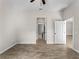 Bedroom with tile floors, ceiling fan and access to hallway at 1417 Longson St, Port Charlotte, FL 33953