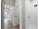 Hallway with access to bedroom and bathroom at 1417 Longson St, Port Charlotte, FL 33953
