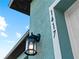 Exterior light fixture with a clear glass panel at 1417 Longson St, Port Charlotte, FL 33953