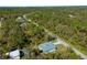 Wide aerial view of the house and surrounding neighborhood at 1417 Longson St, Port Charlotte, FL 33953