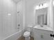 Clean bathroom, white tile, and modern vanity at 2795 Calabash Ln, North Port, FL 34286