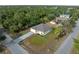 Aerial view of a home with lush green surroundings highlighting its location and neighborhood at 3376 Dunbar St, Port Charlotte, FL 33948