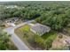 Aerial view of a home showcasing its prime location within a lush, green landscape at 3376 Dunbar St, Port Charlotte, FL 33948