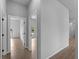 Hallway with tile floors and doorways to other rooms at 3376 Dunbar St, Port Charlotte, FL 33948