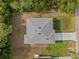 Overhead shot of the modern home showing roof style and driveway at 4081 Felhorn St, Port Charlotte, FL 33948