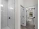 Modern bathroom featuring a shower with white subway tile and sleek, matte black hardware at 4081 Felhorn St, Port Charlotte, FL 33948