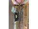 An open electrical panel next to a doorway, with exposed wiring and unfinished walls, highlights the home's electrical system upgrade at 612 Milus St, Punta Gorda, FL 33950