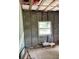 Renovation interior with a window, highlighting the construction with new drywall and block walls at 612 Milus St, Punta Gorda, FL 33950