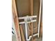 Plumbing installation with a white box and copper pipes, revealing the home's new water supply and distribution system at 612 Milus St, Punta Gorda, FL 33950