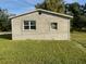 Newly constructed home with stucco exterior and a spacious yard at 612 Milus St, Punta Gorda, FL 33950
