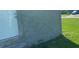 Exterior view of a house with a white door and stucco walls at 612 Milus St, Punta Gorda, FL 33950