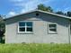 Newly constructed home with stucco exterior and a spacious yard at 612 Milus St, Punta Gorda, FL 33950