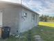 Newly constructed home with stucco exterior and a spacious yard at 612 Milus St, Punta Gorda, FL 33950
