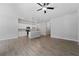 Open concept living space with kitchen, island, and living area at 173 Edgemere Nw St, Port Charlotte, FL 33948