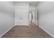Spacious bedroom with double doors and tile flooring at 173 Edgemere Nw St, Port Charlotte, FL 33948