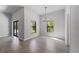 Bright dining area with tile flooring and a modern chandelier at 173 Edgemere Nw St, Port Charlotte, FL 33948