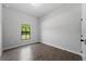 Bright bedroom with large window and tile flooring at 173 Edgemere Nw St, Port Charlotte, FL 33948