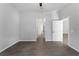 Bright bedroom with tile flooring and access to hallway and bathroom at 173 Edgemere Nw St, Port Charlotte, FL 33948