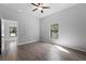 Spacious bedroom with tile floors and large window, offering natural light at 173 Edgemere Nw St, Port Charlotte, FL 33948