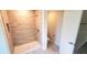 Bathroom with a walk-in shower and tile surround at 2536 Jacobs St, Port Charlotte, FL 33953