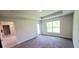 Spacious bedroom with carpet flooring and a large window at 2536 Jacobs St, Port Charlotte, FL 33953