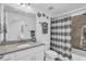 Bathroom featuring a tub-shower combo and a vanity with granite countertop at 14041 Heritage Landing Blvd # 616, Punta Gorda, FL 33955