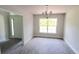 Simple dining room with hardwood floors and a large window at 2552 Jacobs St, Port Charlotte, FL 33953