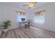 Home office with a desk, chair, and plenty of natural light at 5731 Oakview Ln, Punta Gorda, FL 33950