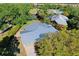 Aerial view highlighting the house's metal roof and location at 5731 Oakview Ln, Punta Gorda, FL 33950