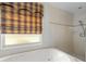 Spa-like bathroom with a large tub and shower at 15 Windward Pl, Placida, FL 33946