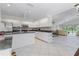 Open kitchen with granite countertops and stainless steel appliances at 15 Windward Pl, Placida, FL 33946