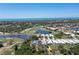 Aerial view highlighting the home's waterfront proximity at 15 Windward Pl, Placida, FL 33946