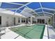 Inviting screened pool with ample lounge space for relaxation at 15 Windward Pl, Placida, FL 33946