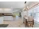 Bright kitchen with granite countertops and view into the Gathering room at 15 Windward Pl, Placida, FL 33946
