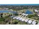 Aerial view showing home's location in a golf course community at 15 Windward Pl, Placida, FL 33946