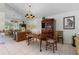 Formal dining room with wood furniture and a chandelier at 15 Windward Pl, Placida, FL 33946