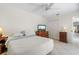 Spacious bedroom with a king bed, dresser, and walk-in closet at 15 Windward Pl, Placida, FL 33946