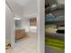 Bathroom with a tub, shower, and linen closet at 15 Windward Pl, Placida, FL 33946