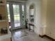 Bright entryway with tiled floor and access to the outdoors at 18029 Ohara Dr, Port Charlotte, FL 33948