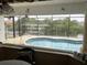 Inviting pool with canal views, ideal for relaxation and entertainment at 18029 Ohara Dr, Port Charlotte, FL 33948