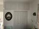 Large bedroom closet with double doors and overhead storage at 18029 Ohara Dr, Port Charlotte, FL 33948