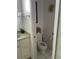 Small half bathroom with toilet and sink at 18029 Ohara Dr, Port Charlotte, FL 33948