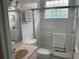 Bathroom featuring a shower/tub combo and vanity at 18029 Ohara Dr, Port Charlotte, FL 33948