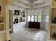 Elegant dining room featuring a chandelier and built-in shelving at 18029 Ohara Dr, Port Charlotte, FL 33948