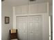 Spacious bedroom closet with double doors and overhead storage at 18029 Ohara Dr, Port Charlotte, FL 33948
