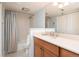Bathroom with tub shower combo and vanity at 2675 Gulf Of Mexico Dr # 204, Longboat Key, FL 34228