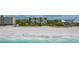Aerial view of beachfront condo building and beach at 2675 Gulf Of Mexico Dr # 204, Longboat Key, FL 34228